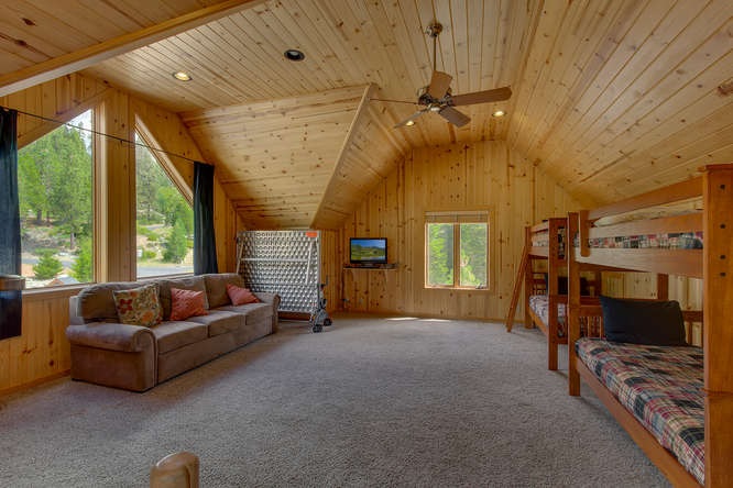 16073 Matt's Mountain Place Truckee, CA 96161 - Photo 13 of 14 a living room with furniture and a flat screen tv