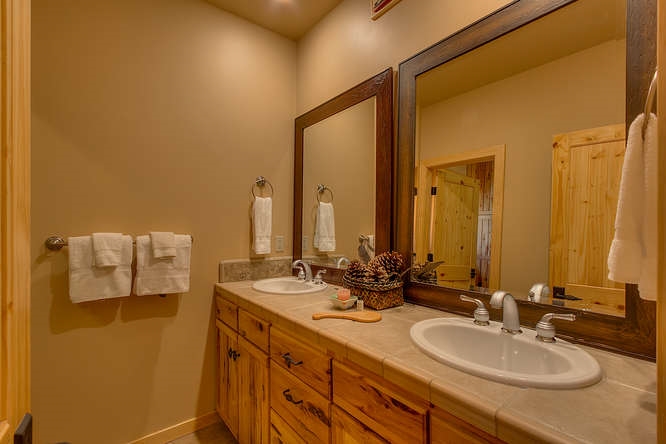 16073 Matt's Mountain Place Truckee, CA 96161 - Photo 8 of 14 a bathroom with double sink and a mirror