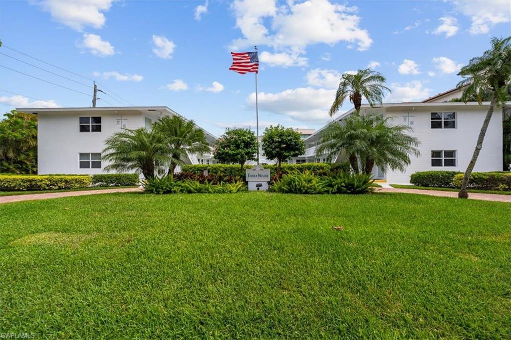 540 4th Avenue South, Unit 13 Naples, FL 34102 - Photo 18 of 19 a view of a house with a back yard