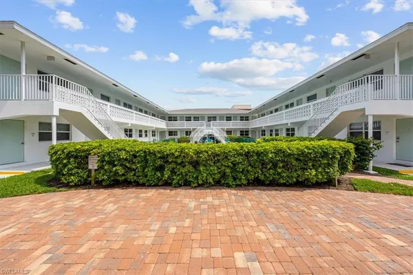 a front view of house with a yard