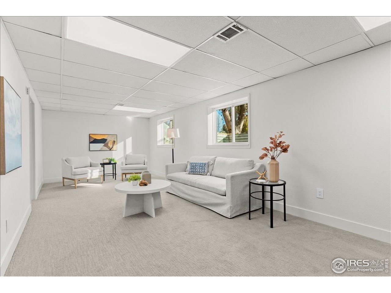 1513 Independence Road Fort Collins, CO 80526 - Photo 36 of 50 Lots of light in this spacious rec room