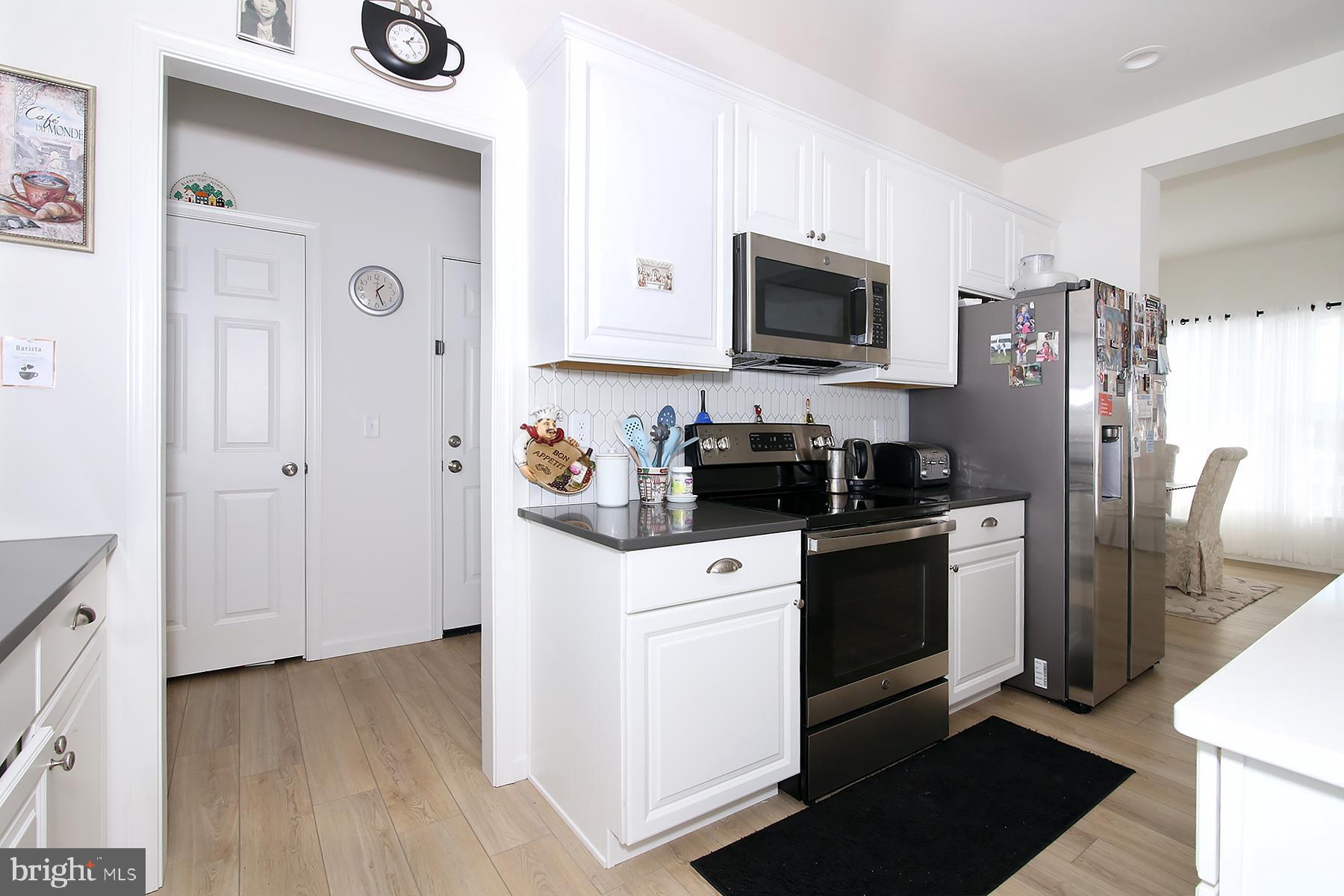 216 Copper Ridge Drive Newmanstown, PA 17073 - Photo 15 of 45 a kitchen with stainless steel appliances a refrigerator stove and microwave