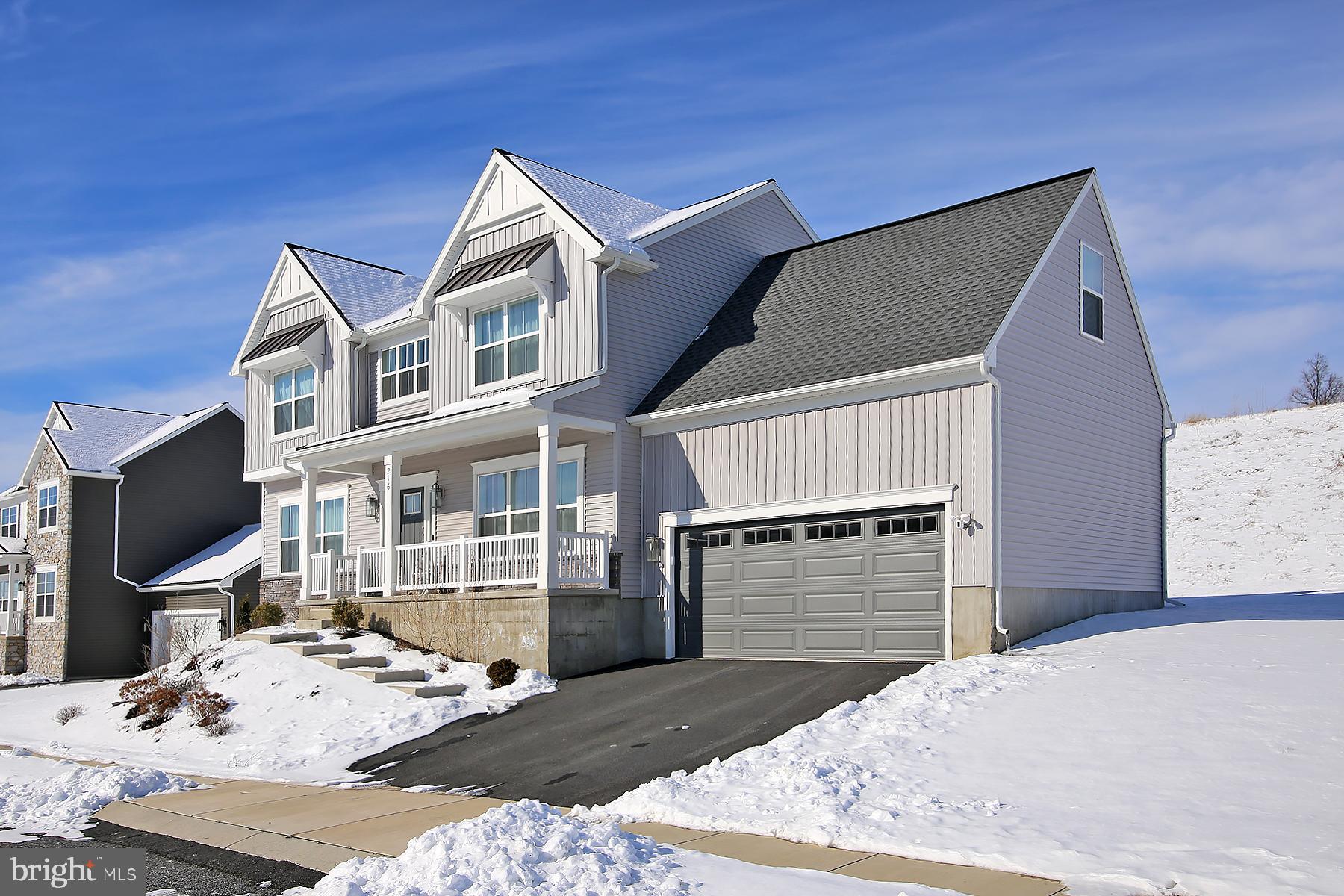 216 Copper Ridge Drive Newmanstown, PA 17073 - Photo 2 of 45 a view of a bedroom with a flat screen tv