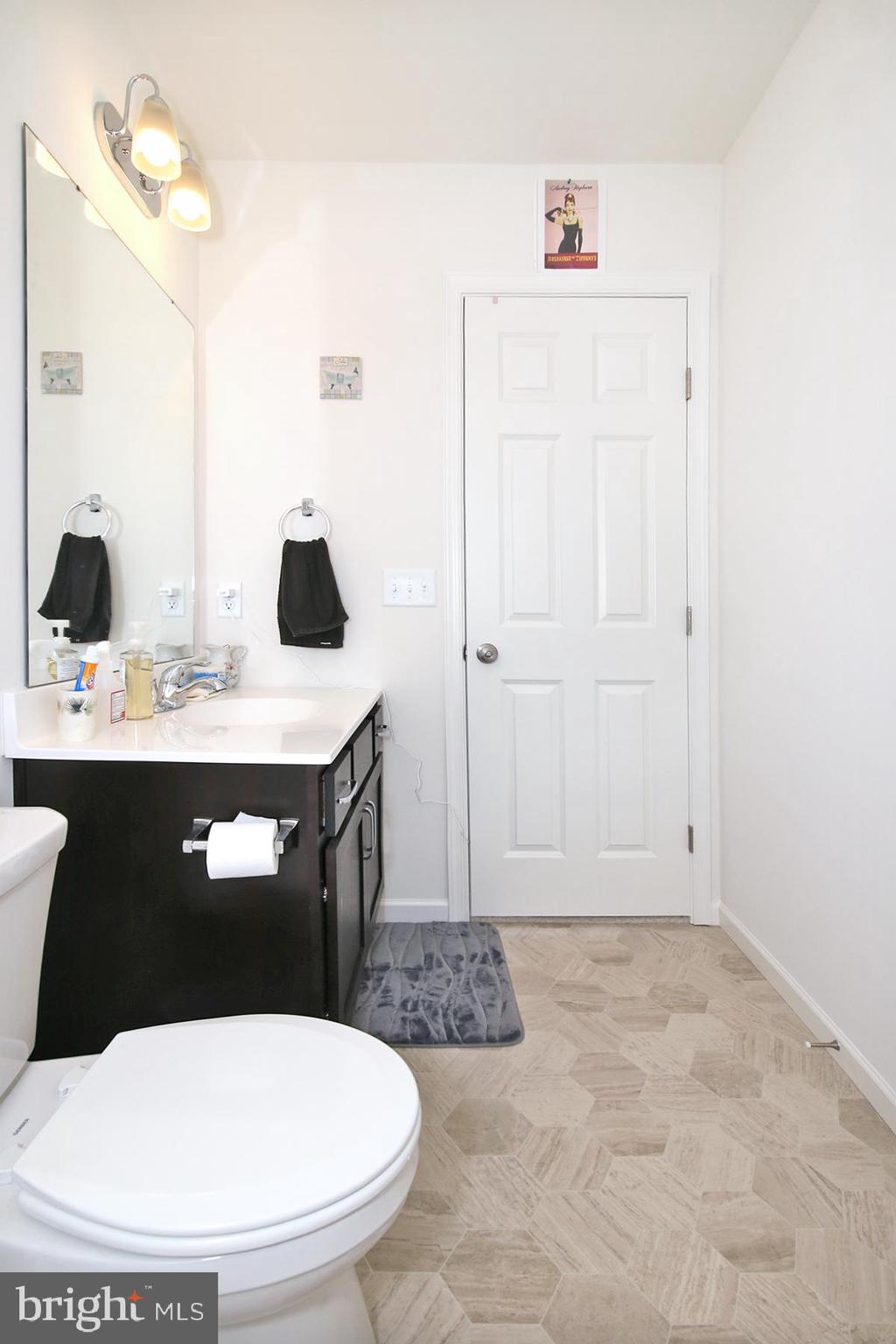 216 Copper Ridge Drive Newmanstown, PA 17073 - Photo 23 of 45 a bathroom with a sink a toilet and shower