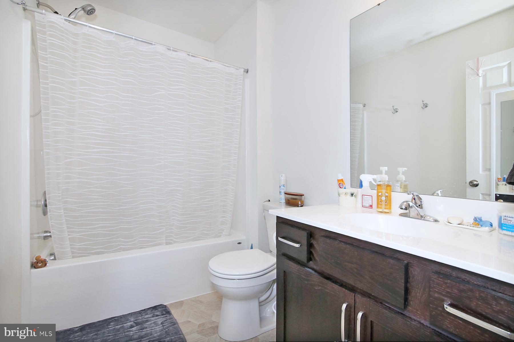 216 Copper Ridge Drive Newmanstown, PA 17073 - Photo 24 of 45 a bathroom with a sink a toilet and shower