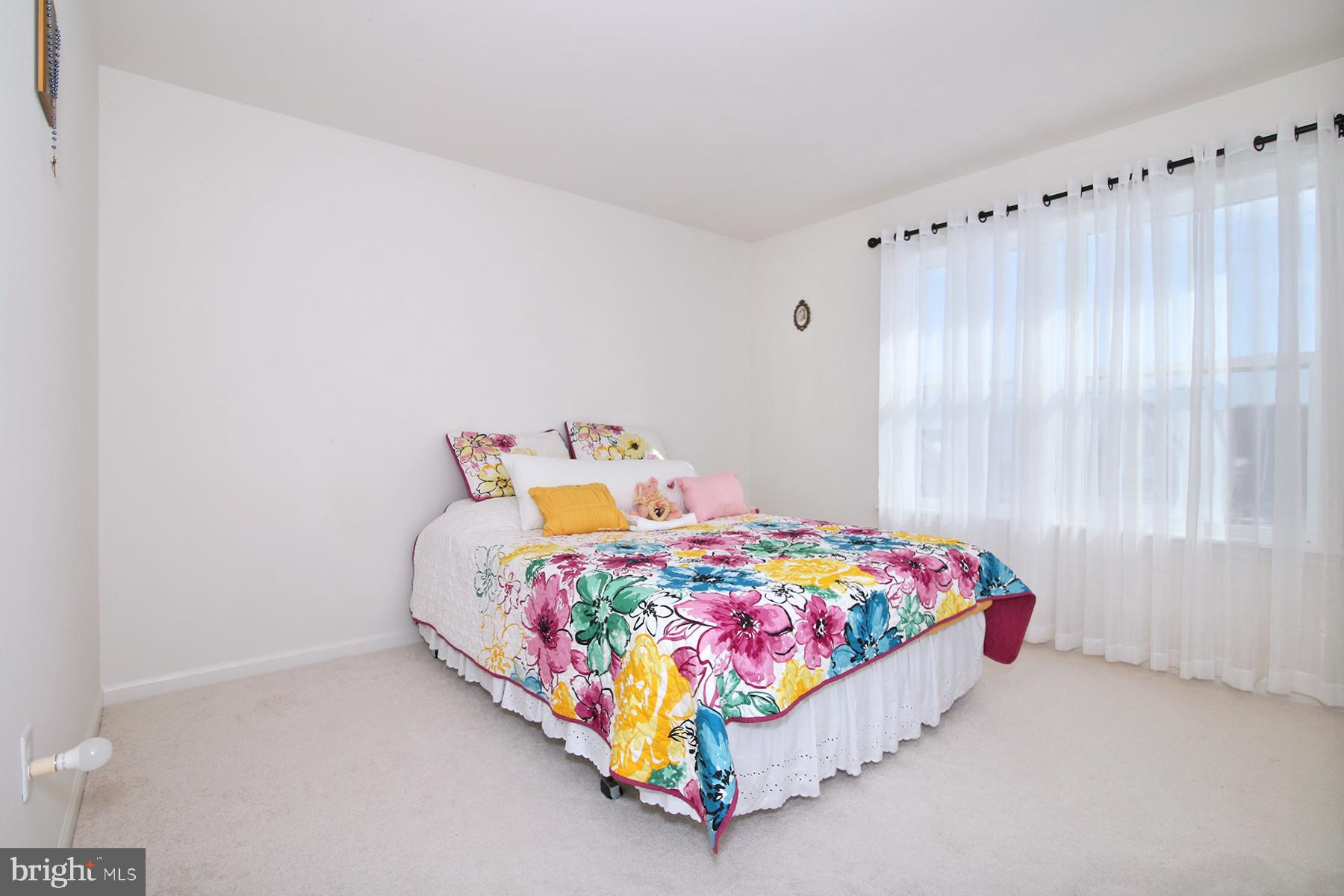 216 Copper Ridge Drive Newmanstown, PA 17073 - Photo 29 of 45 a bedroom with a bed and a window