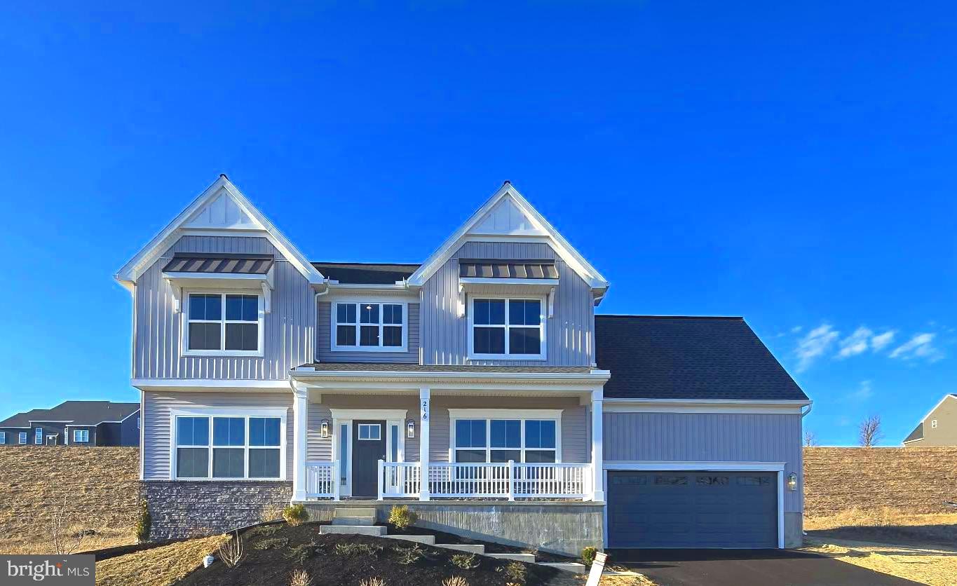 216 Copper Ridge Drive Newmanstown, PA 17073 - Photo 4 of 45 a front view of a house with a yard