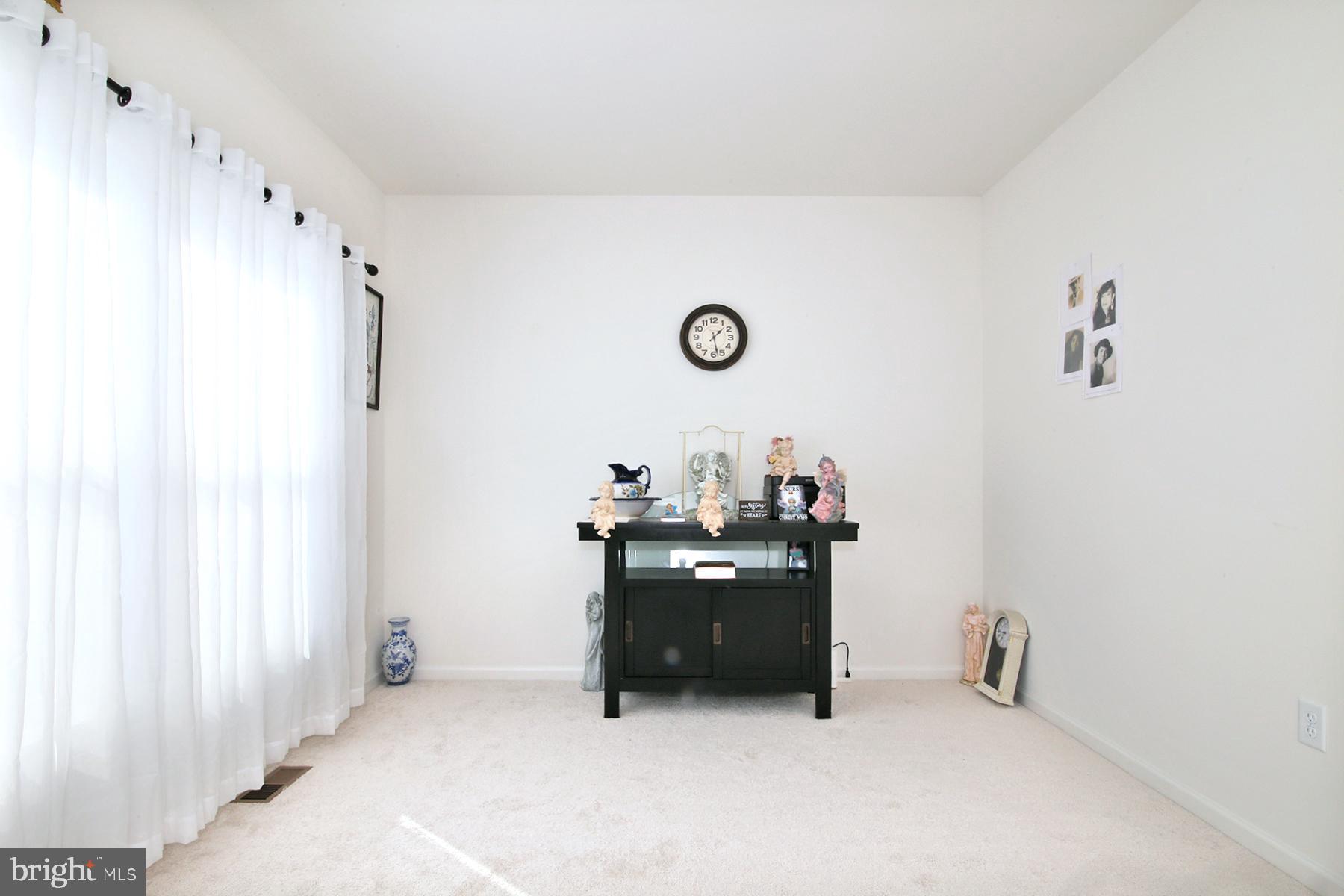 216 Copper Ridge Drive Newmanstown, PA 17073 - Photo 42 of 45 a room with a table and a fireplace