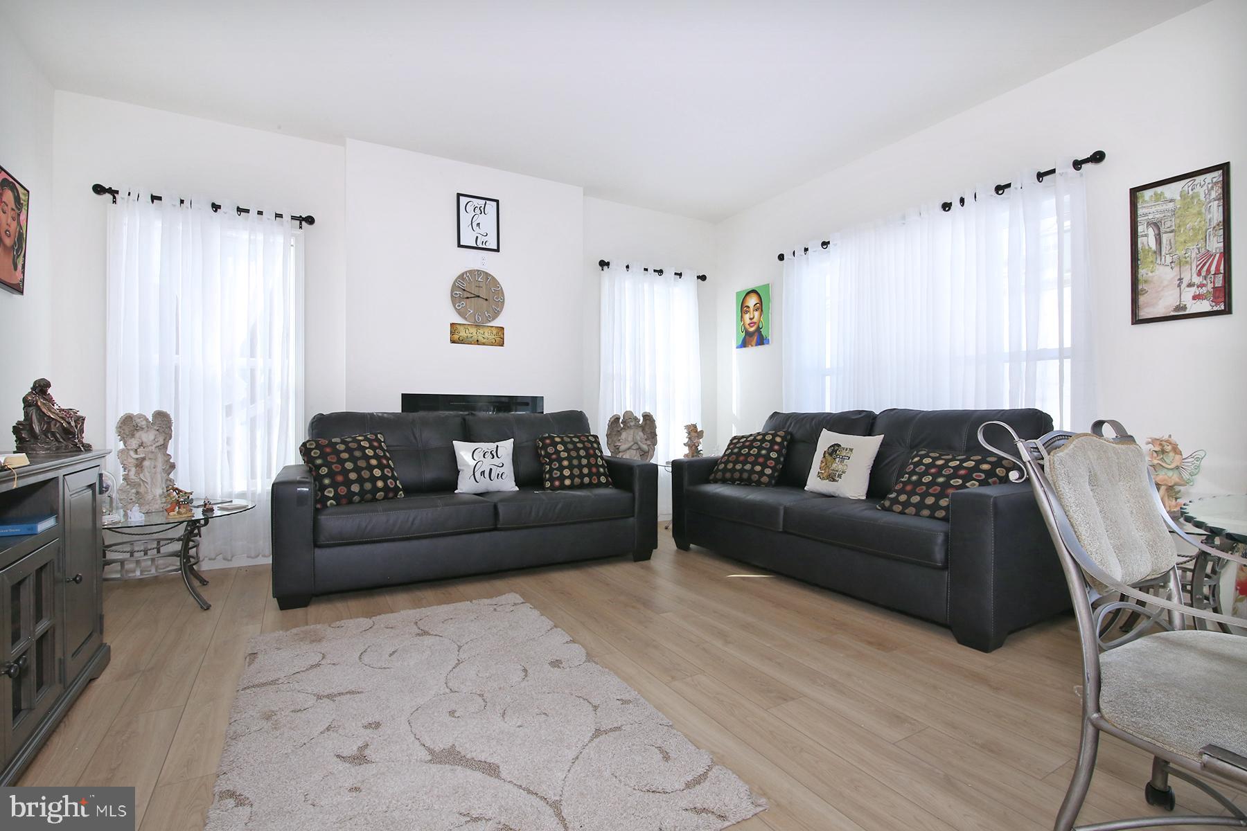 216 Copper Ridge Drive Newmanstown, PA 17073 - Photo 45 of 45 a living room with furniture and a wooden floor