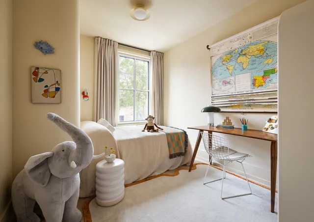 a living room with furniture and window