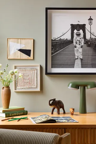 a view of a room with a table and chairs