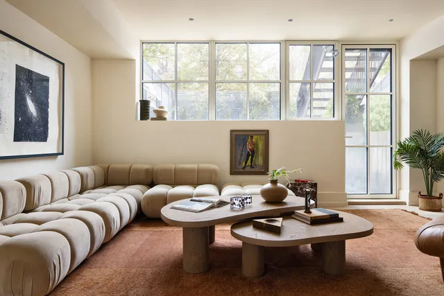 a view of a chair and table in a room