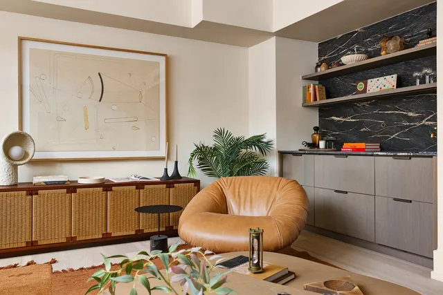 a bathroom with a sink and a window