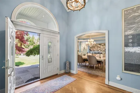 a view of entryway livingroom and hall