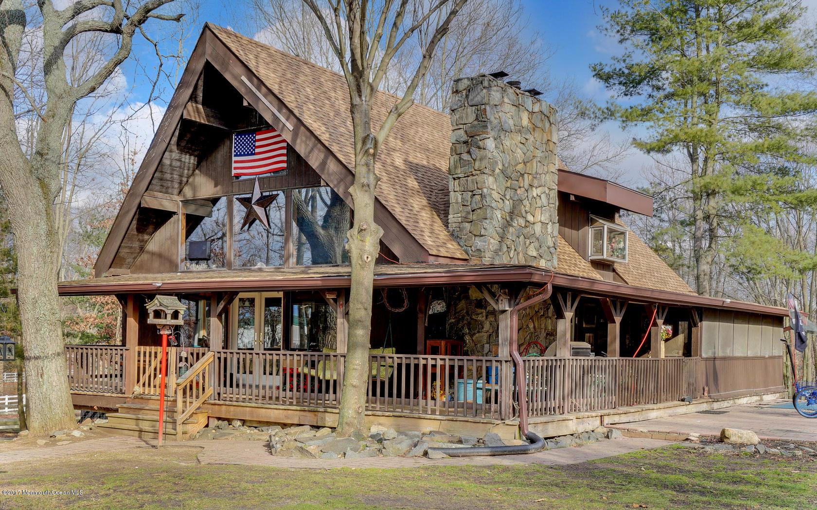 351 Pfister Road Jackson, NJ 08527 - Photo 1 of 42 a front view of a house with a yard
