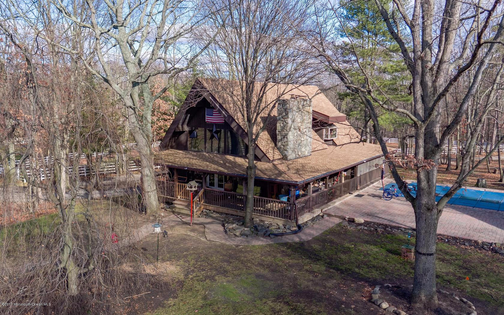 351 Pfister Road Jackson, NJ 08527 - Photo 3 of 42 a view of a house with a large tree