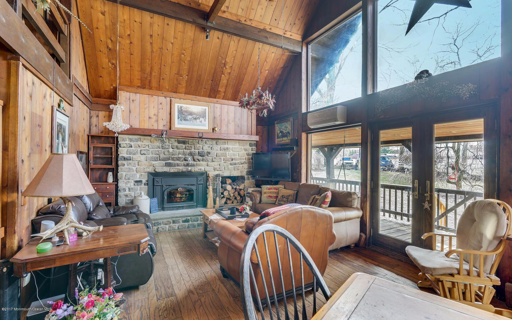 351 Pfister Road Jackson, NJ 08527 - Photo 4 of 42 a bed room with furniture and a fireplace