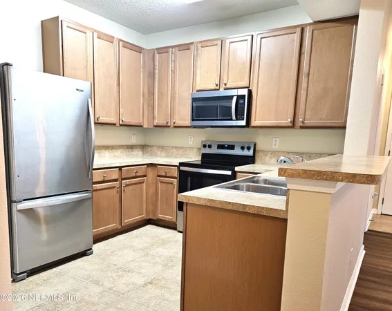 $164,900 | 575 East Oakleaf Plantation Parkway, Unit 1208, Orange Park, FL 32065