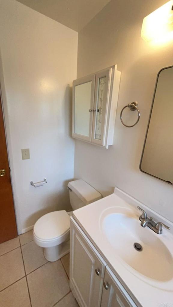 2005-07 Camino Rainbow Fallbrook, CA 92028 - Photo 24 of 65 a bathroom with a sink a toilet and mirror
