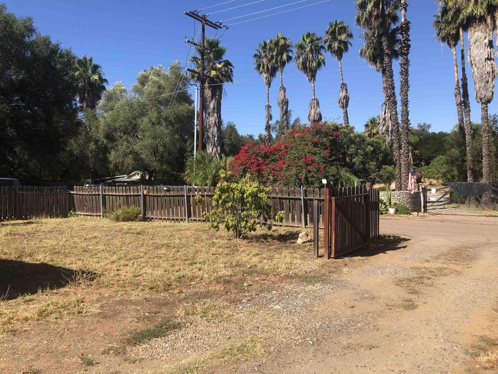 2005-07 Camino Rainbow Fallbrook, CA 92028 - Photo 3 of 65 a view of a yard with wooden fence