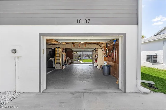 a view of a livingroom and entryway