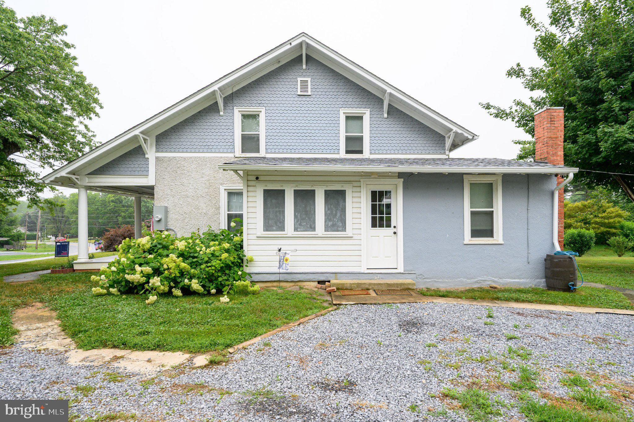 139 Bryarly Road Winchester, VA 22603 - Photo 59 of 76 Charming two-tone home with lush greenery.