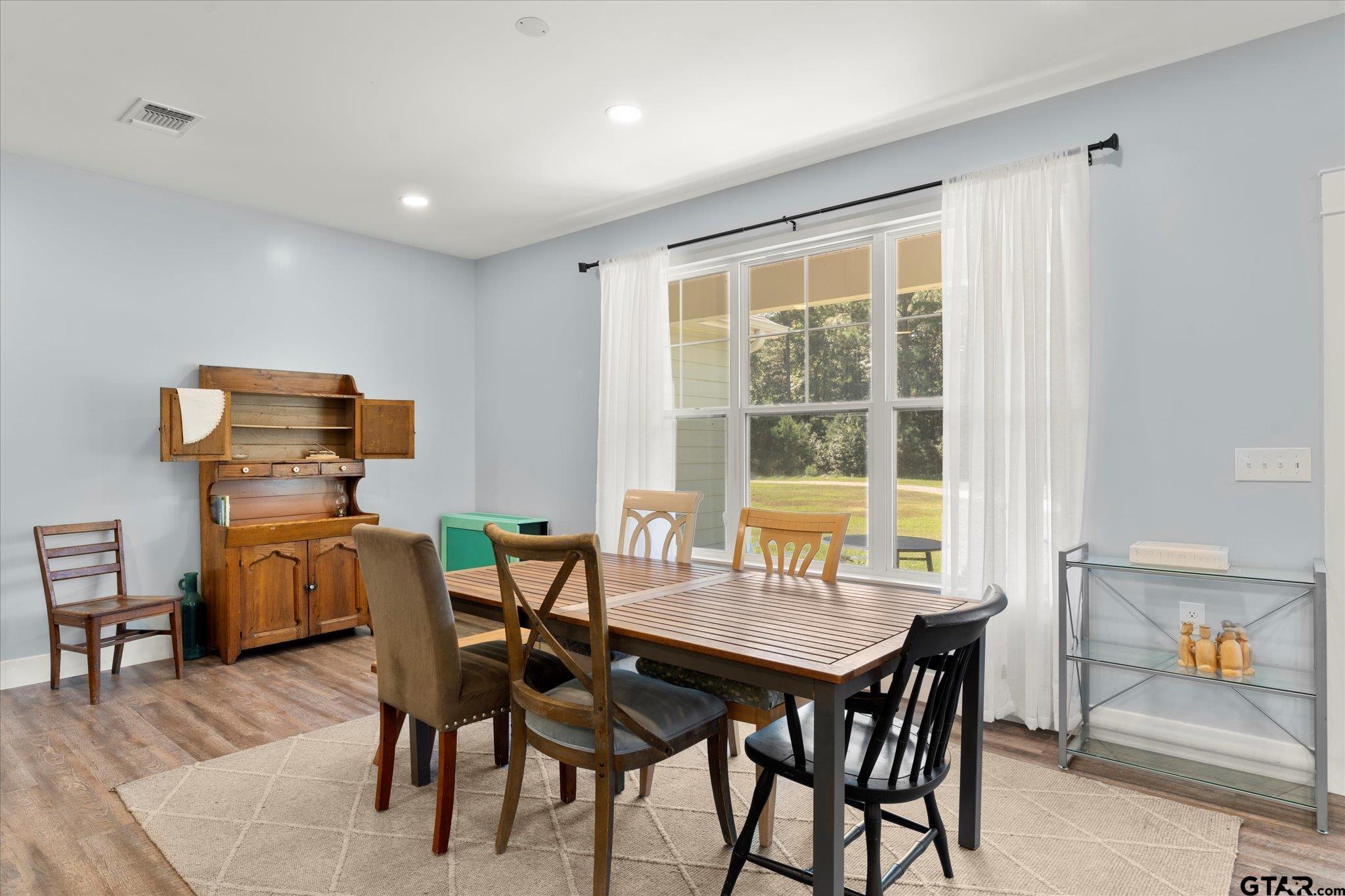 1663 County Road 4510 Pittsburg, TX 75686 - Photo 20 of 34 a view of a dining room with furniture and window
