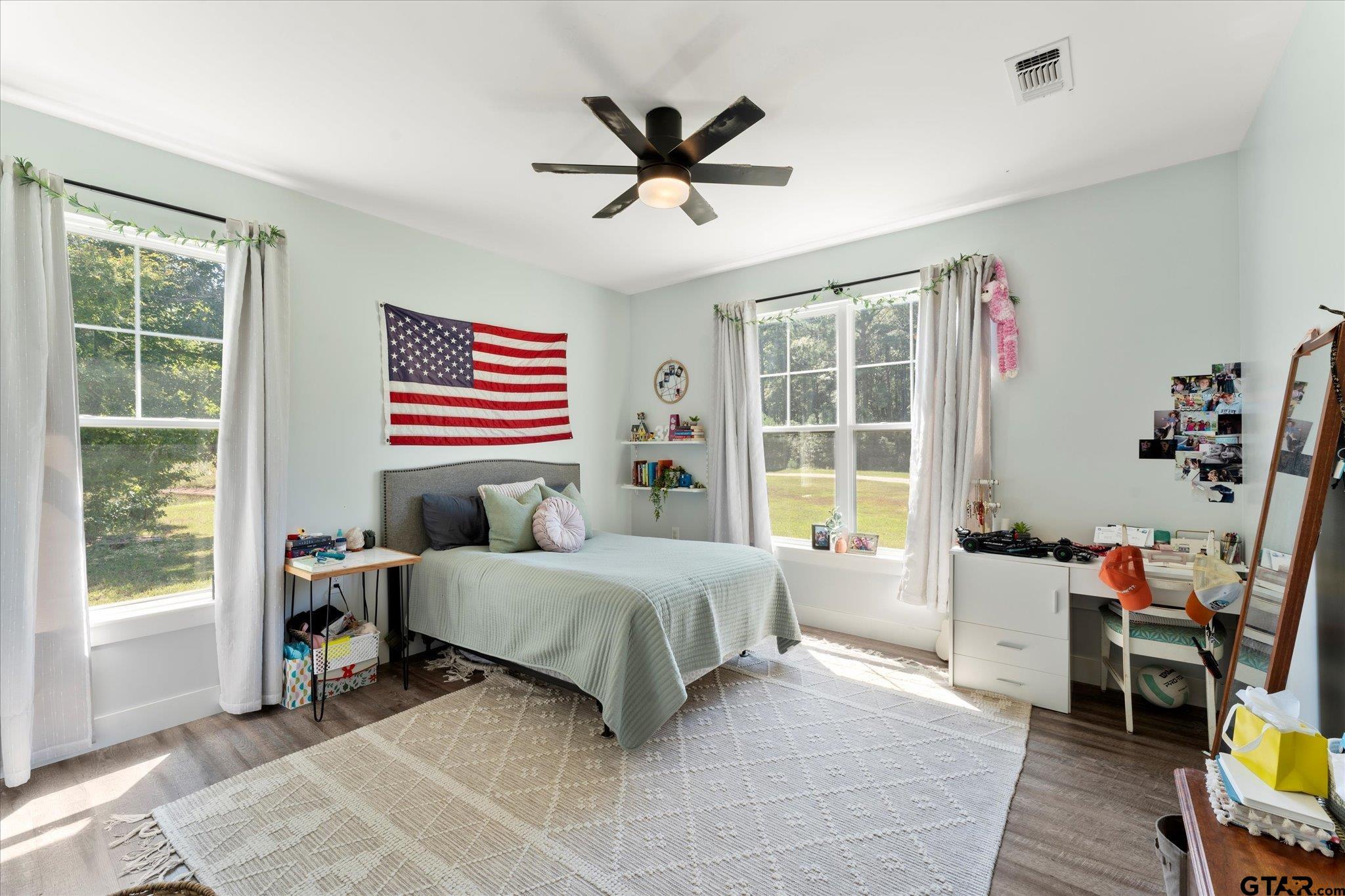 1663 County Road 4510 Pittsburg, TX 75686 - Photo 24 of 34 a bedroom with a bed and a window