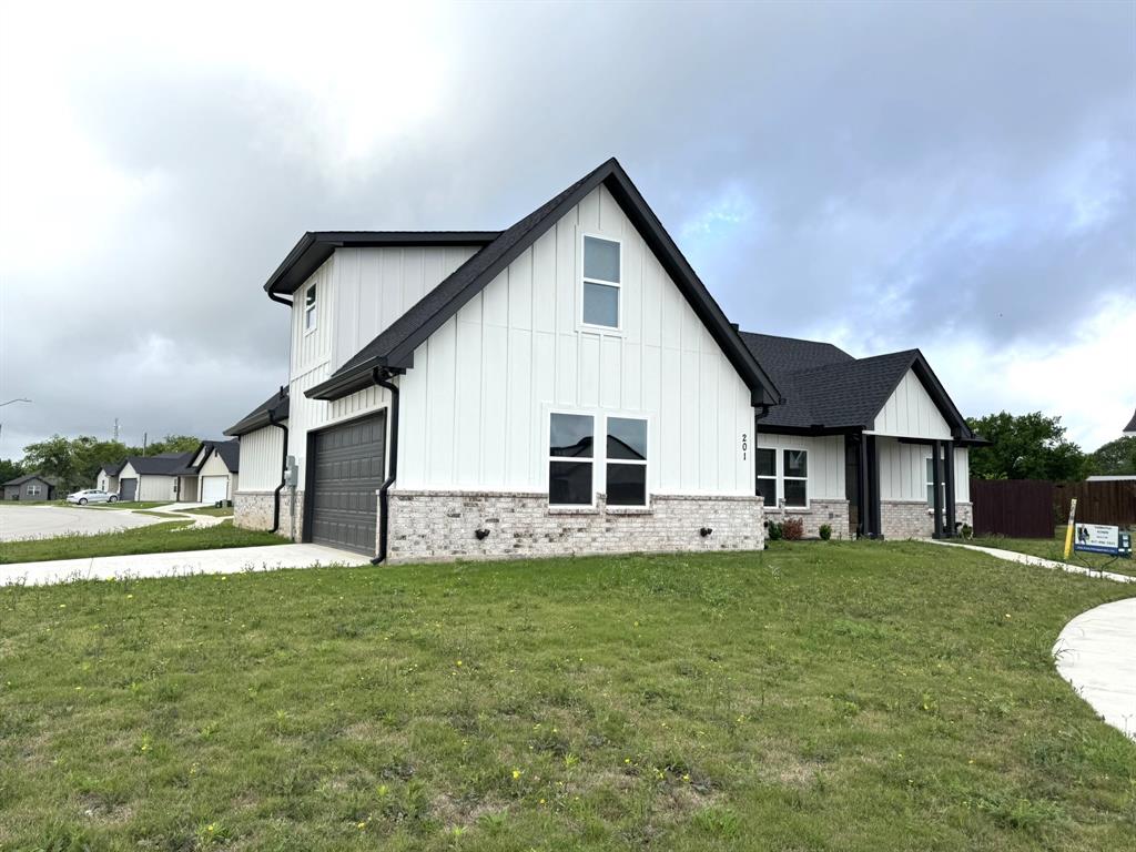 201 Bluff Court Godley, TX 76044 - Photo 1 of 17 a view of a house with a yard