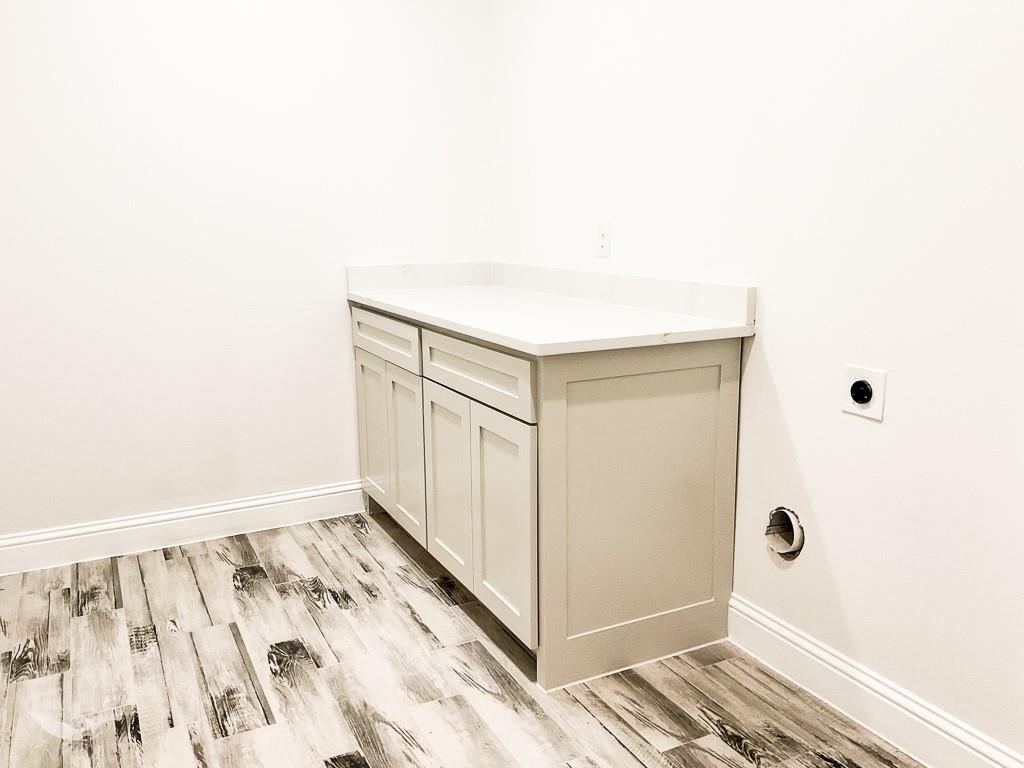 201 Bluff Court Godley, TX 76044 - Photo 13 of 17 a view of wooden floor