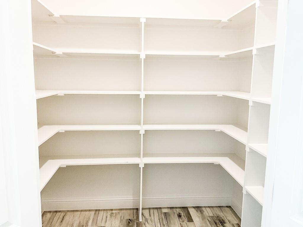 201 Bluff Court Godley, TX 76044 - Photo 8 of 17 a view of a room with shelf