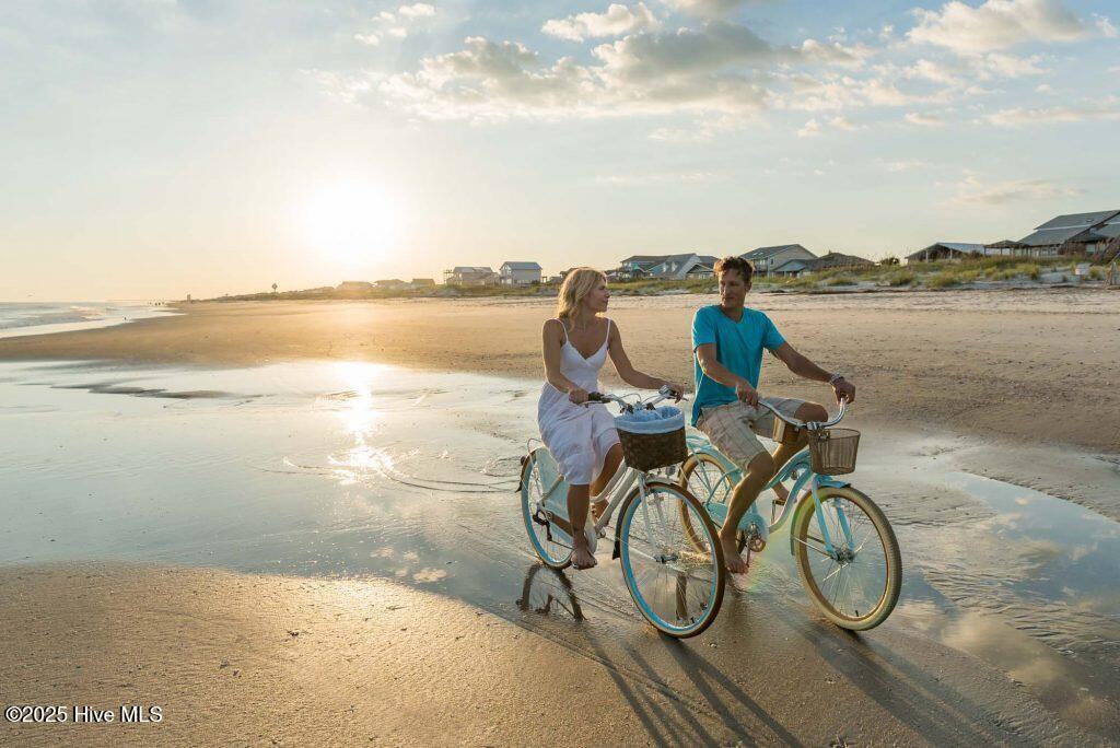 573 Ridge Road Northeast, Unit LOT 116 Leland, NC 28451 - Photo 40 of 43 Biking on the Beach