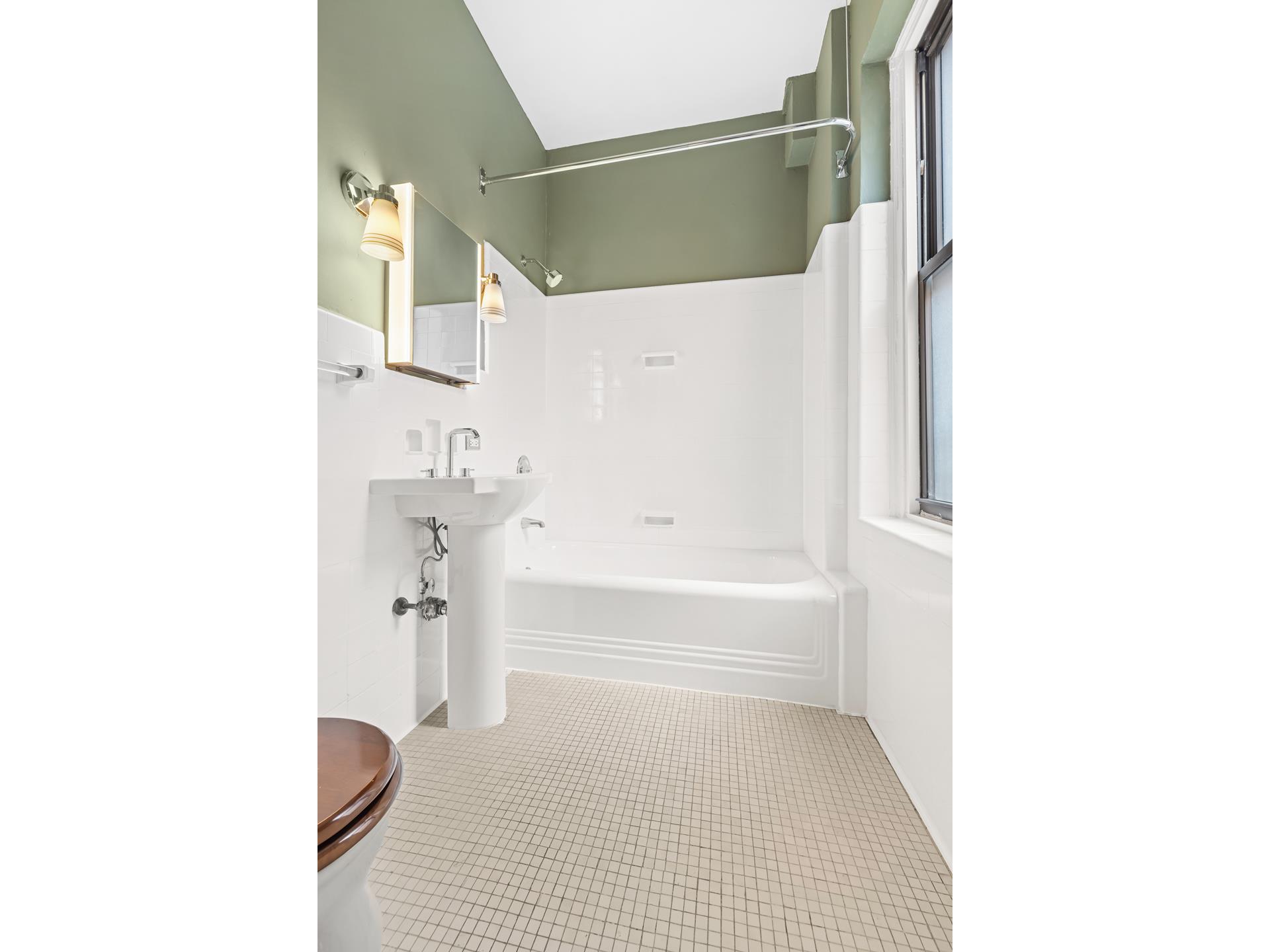 340 West 86th Street, Unit 11C Manhattan, NY 10024 - Photo 13 of 15 a bathroom with a bathtub and a shower