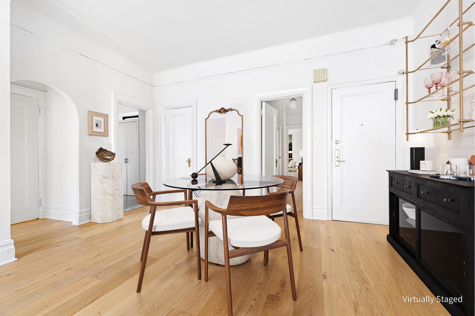 340 West 86th Street, Unit 11C Manhattan, NY 10024 - Photo 3 of 15 a view of a workspace with furniture and wooden floor