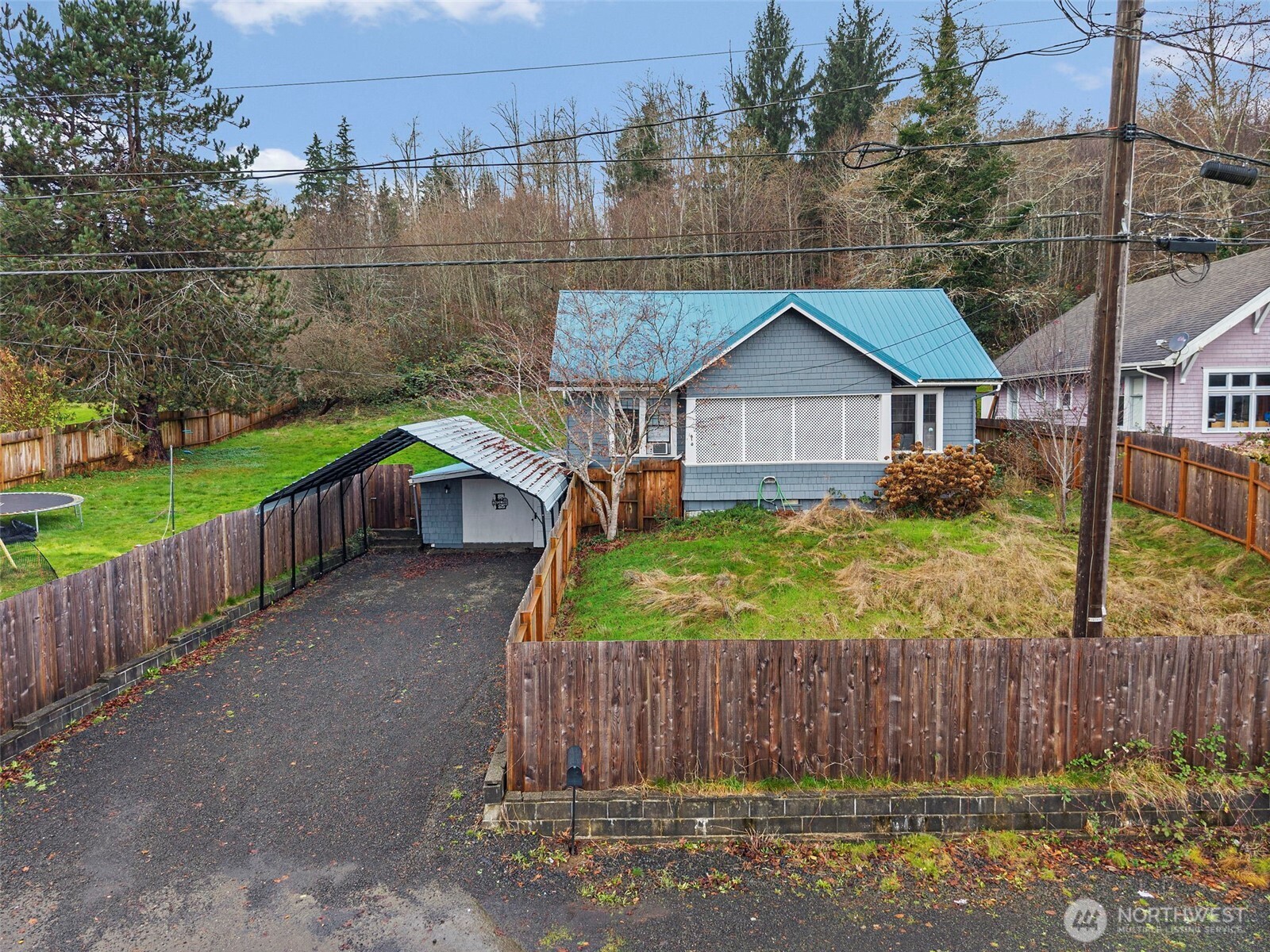 610 Barnhart Street Raymond, WA 98577 - Photo 2 of 34 a house view with a garden space