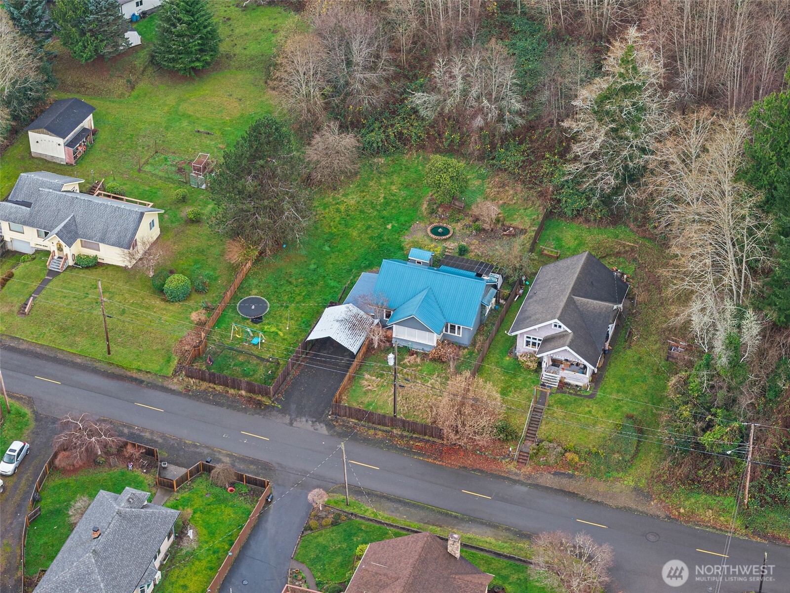 610 Barnhart Street Raymond, WA 98577 - Photo 3 of 34 an aerial view of a house with garden space and street view