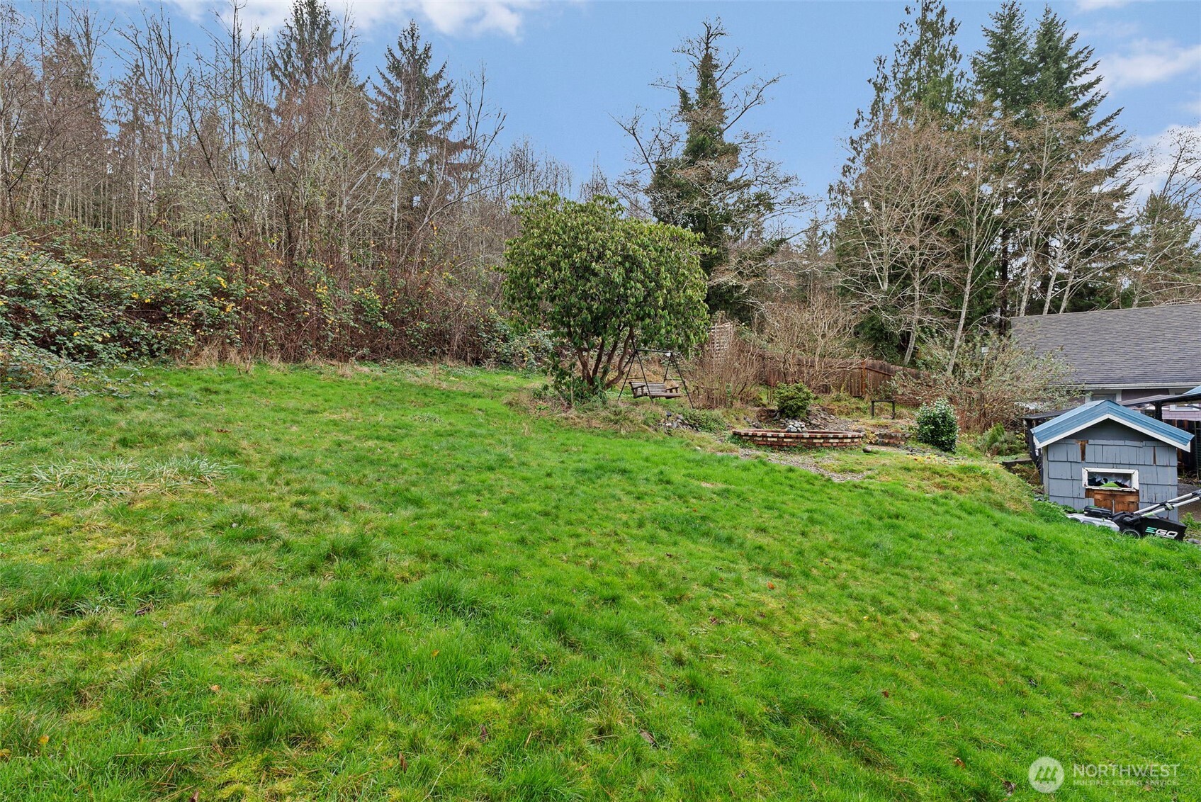 610 Barnhart Street Raymond, WA 98577 - Photo 32 of 34 a view of a house with a yard