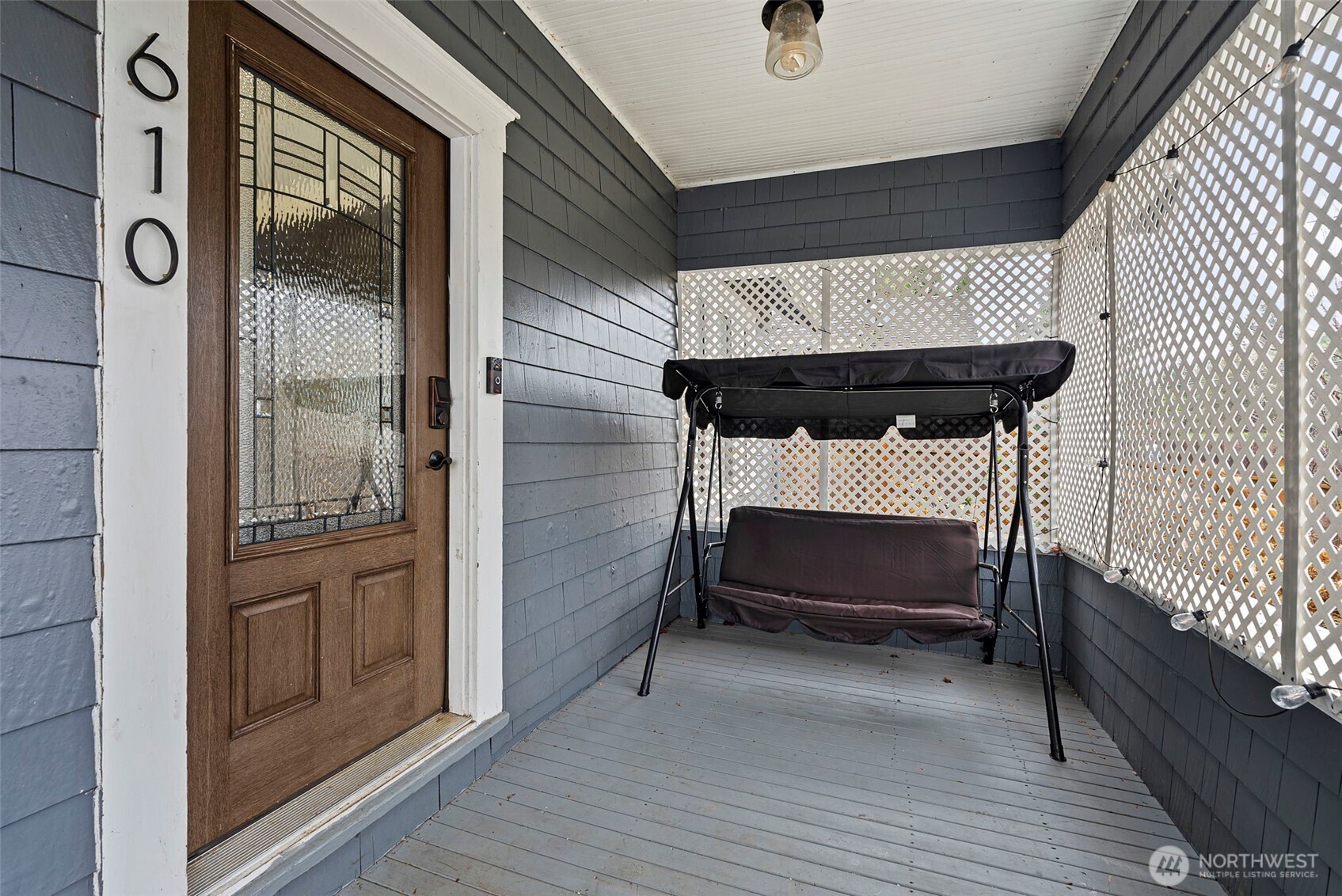 610 Barnhart Street Raymond, WA 98577 - Photo 7 of 34 a bedroom with furniture and a window