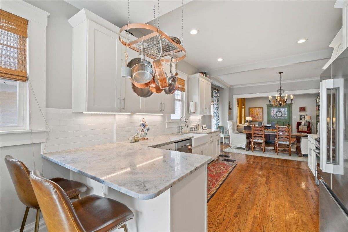 1937 Harbert Avenue Memphis, TN 38104 - Photo 11 of 32 a kitchen with a table and chairs in it