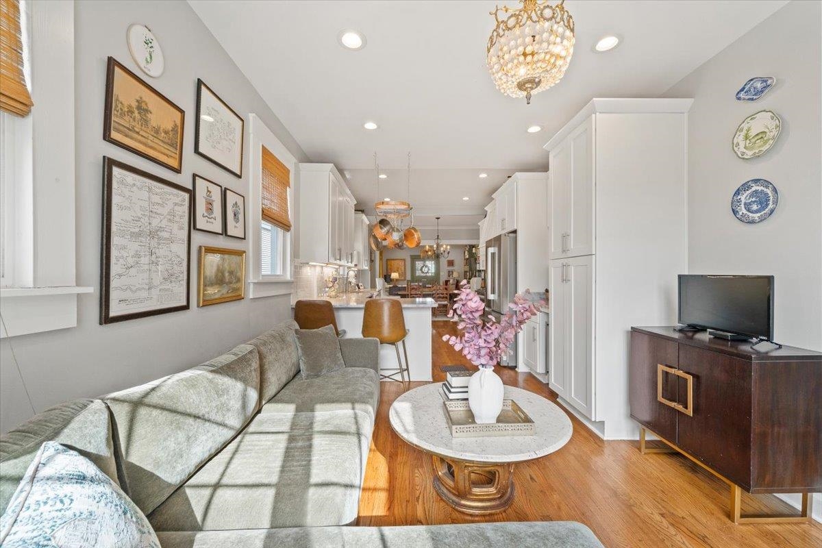 1937 Harbert Avenue Memphis, TN 38104 - Photo 14 of 32 a living room with furniture and a flat screen tv