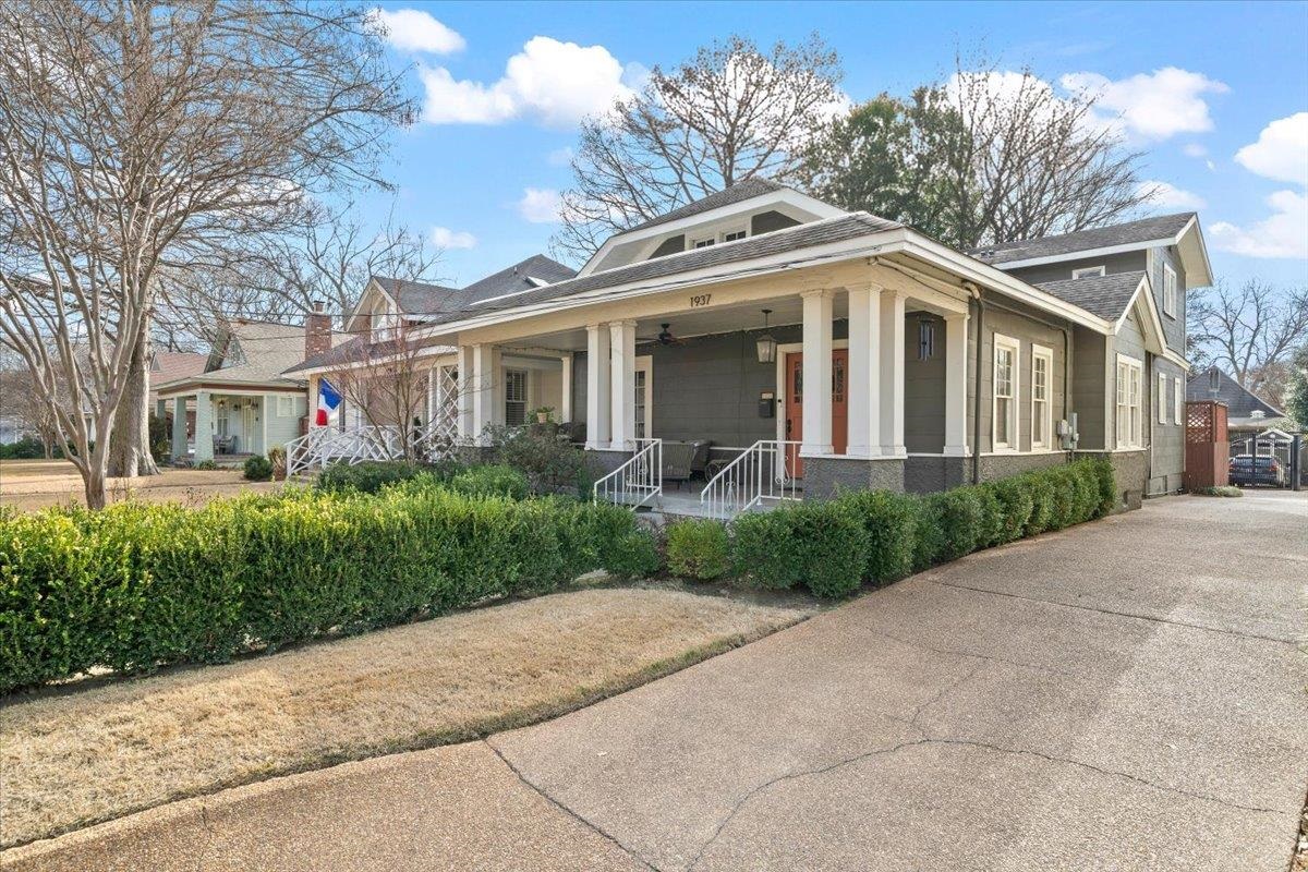 1937 Harbert Avenue Memphis, TN 38104 - Photo 2 of 32 a front view of a house with a yard and potted plants