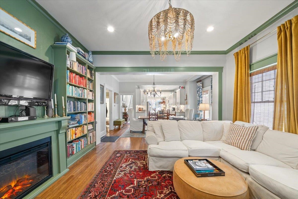 1937 Harbert Avenue Memphis, TN 38104 - Photo 4 of 32 a living room with fireplace furniture and a flat screen tv