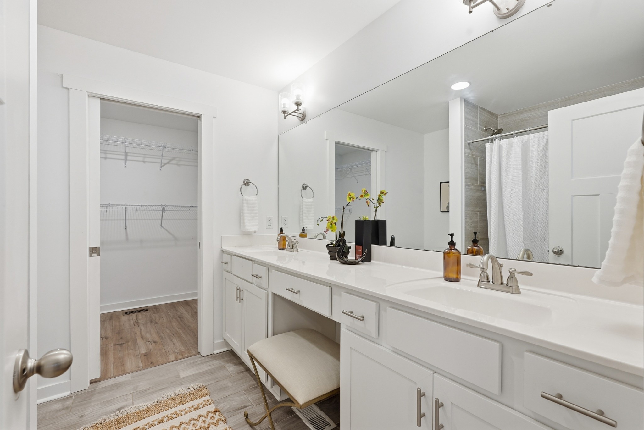 113 11th Avenue West Springfield, TN 37172 - Photo 14 of 28 a bathroom with a sink double vanity granite tub shower and a mirror