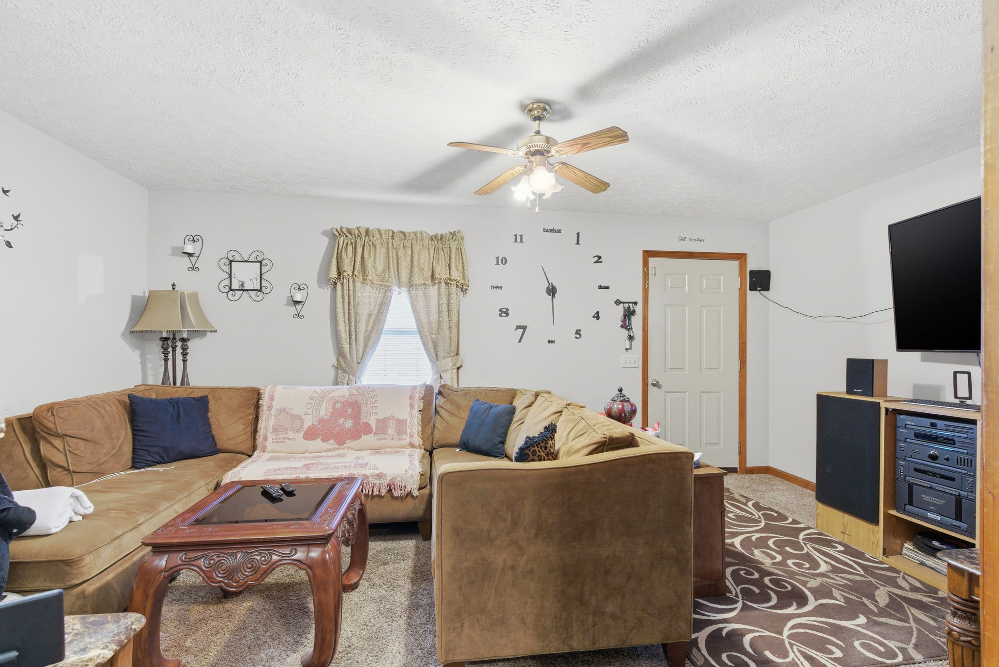 109 Gayla Court Portland, TN 37148 - Photo 31 of 48 a living room with furniture and a flat screen tv