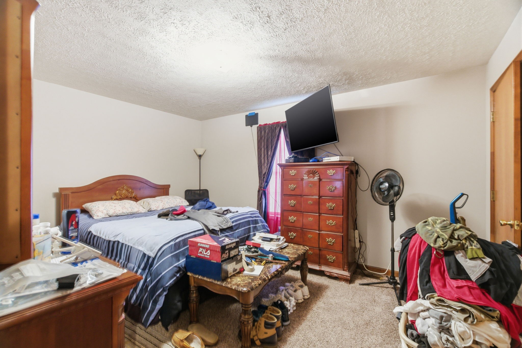 109 Gayla Court Portland, TN 37148 - Photo 40 of 48 a bedroom with two bed and a flat screen tv