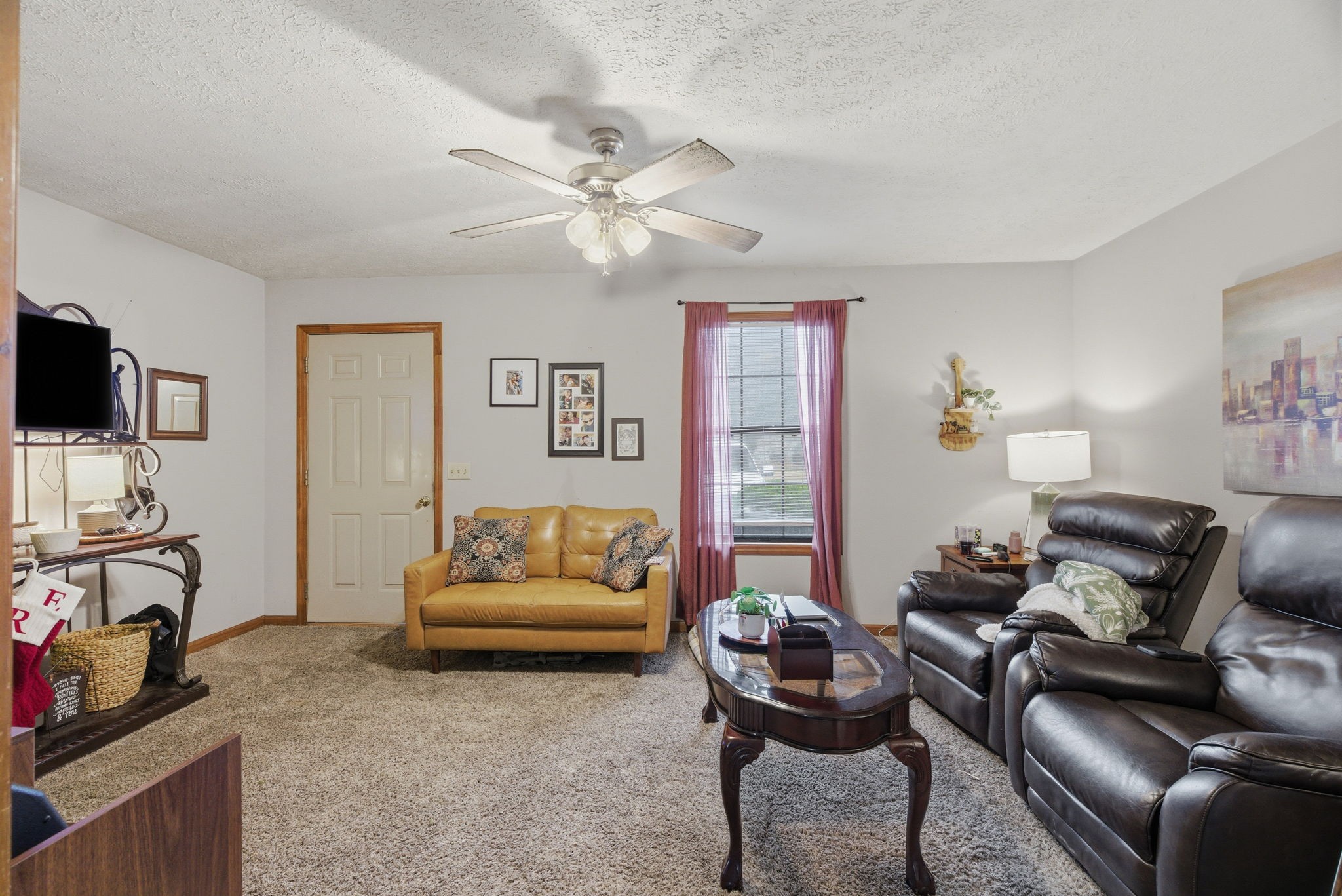 109 Gayla Court Portland, TN 37148 - Photo 7 of 48 a living room with furniture and a flat screen tv