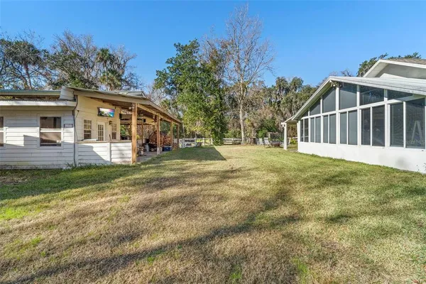 a aerial view of residential house with outdoor space