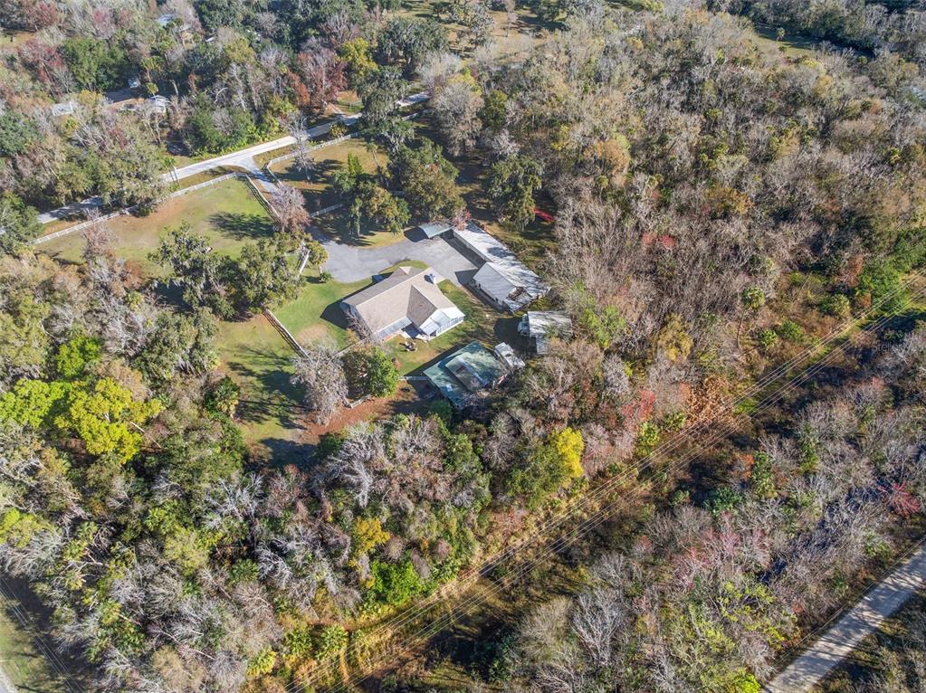 3080 Ragis Road Edgewater, FL 32132 - Photo 30 of 86 a aerial view of residential house with outdoor space