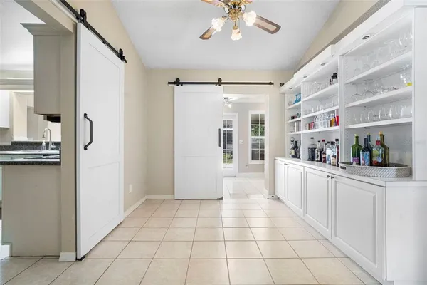 a kitchen with a refrigerator stove and sink
