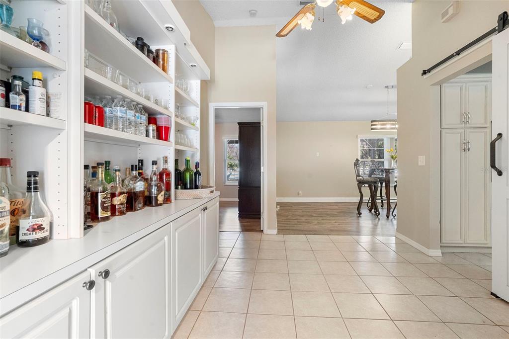 3080 Ragis Road Edgewater, FL 32132 - Photo 43 of 86 a kitchen with stainless steel appliances granite countertop a refrigerator and a sink